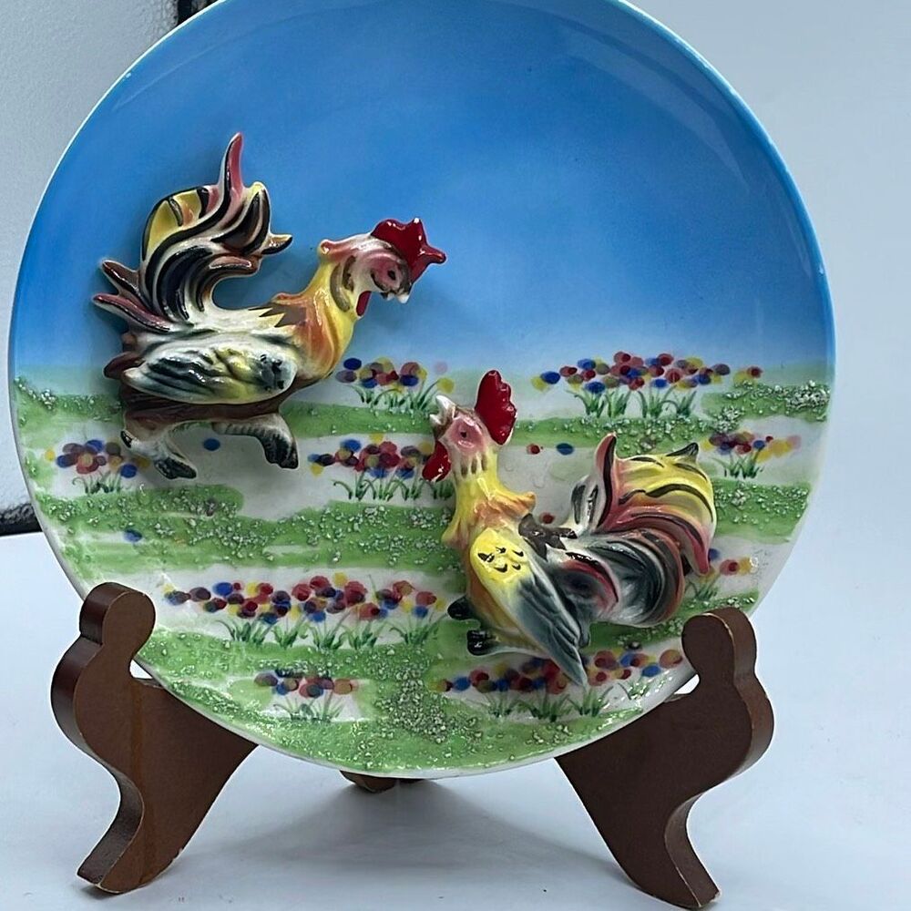 Vintage 3D porcelain rooster fight hanging plate.